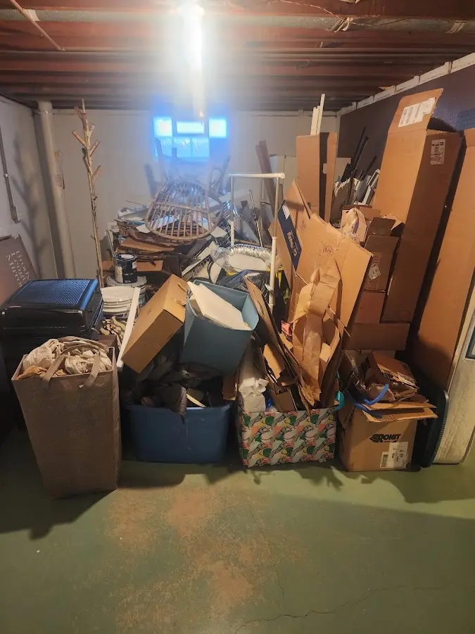 Roll-off dumpster container at job site for Yard Waste Dumpster Rental in Tuscaloosa